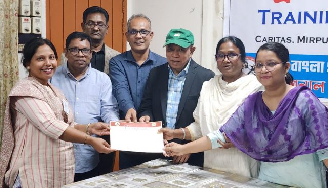 Handing over certificates to participants of the training of trainers organized by the National Workers Unity Center and Green Bangla Garment Workers Federation
