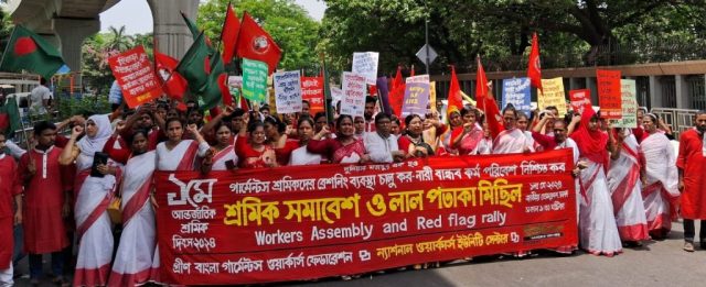 Workers' rally and red flag rally organized by National Workers Center and Green Bangla Garment Workers Federation on the occasion of International Workers' Day 2024